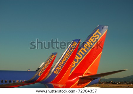 SAN JOSE, CA - JULY 29: Southwest Airlines aircraft at San Jose International Airport, July 29, 2010. Airlines have been raising ticket prices in response to rising fuel costs.