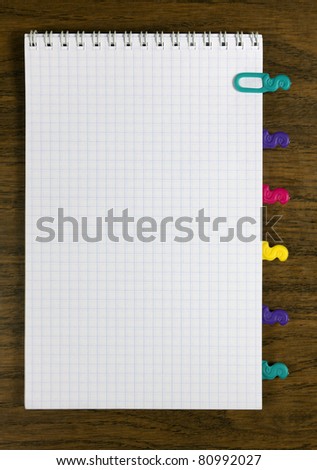 notepad with colored tabbed