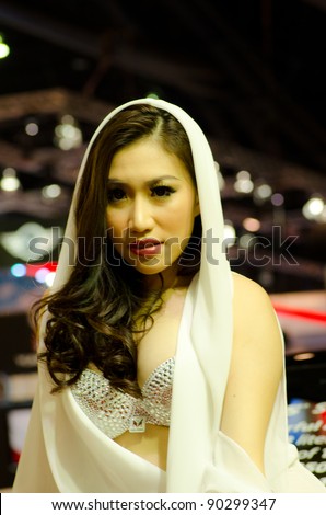 BANGKOK, THAILAND - DECEMBER 6: Unidentified female presenter at BARBUS booth in THE 28th THAILAND INTERNATIONAL MOTOR EXPO 2011 on December 6, 2011 in Bangkok, Thailand.