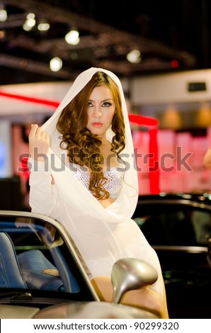 BANGKOK, THAILAND - DECEMBER 6: Unidentified female presenter at BARBUS booth in THE 28th THAILAND INTERNATIONAL MOTOR EXPO 2011 on December 6, 2011 in Bangkok, Thailand.