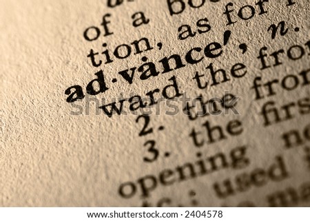 The word advance. Close-up of the word advance in a dictionary.