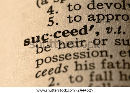 The word succeed. Close-up of the word succeed in a dictionary.