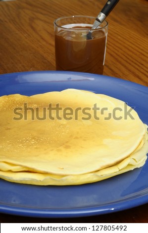 Freshed cooked pancakes for Candlemas and chocolate paste