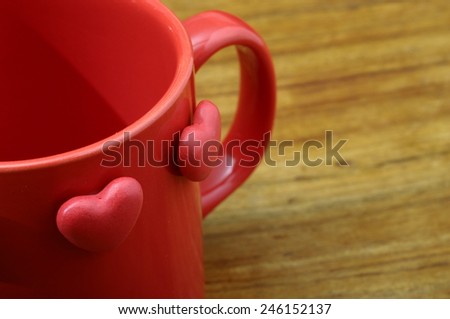 Red heart on coffee mug for love and valentine\'s day celebration