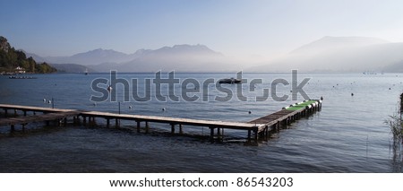 Boat pontoon and view of Annecy's lake and mountains in France