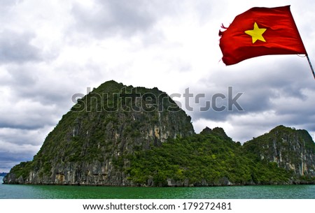 Panorama of Ha Long Bay and Vietnamese flag, Ha Long Bay, Vietnam
