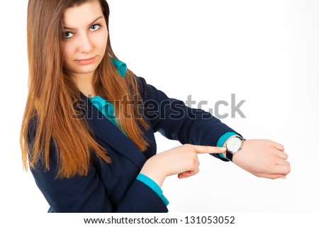 angry business woman pointing her watch over white background