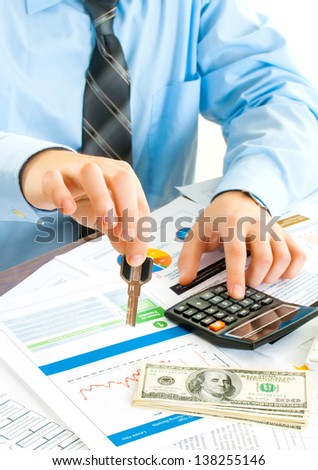 young business man giving key and account money