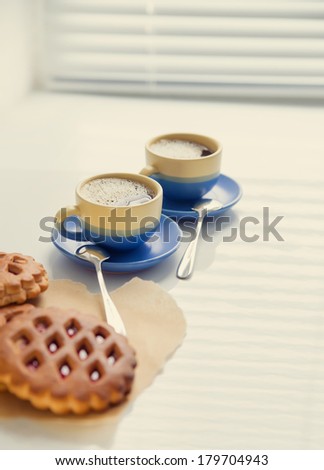 hot coffee and cookies in morning. Soft vintage colors
