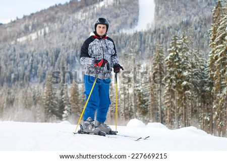 young man on skis in snow