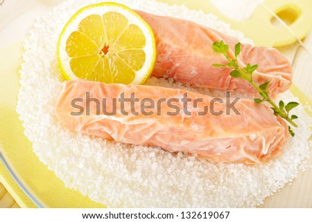 Frozen salmon fillet with lemon