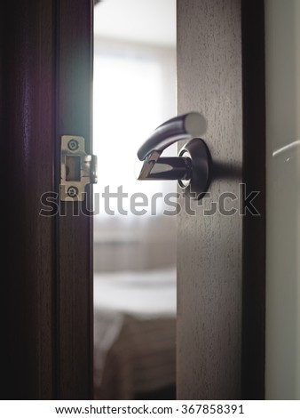 Door to the bedroom, close-up of the door handle