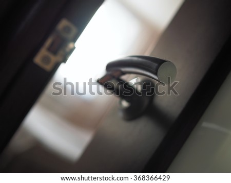 Close up of the door handle, shallow depth of field