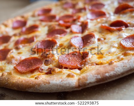 Fresh baked pepperoni pizza, shallow depth of field