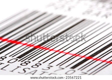 Barcode label with red laser beam. Macro shot, shallow DOF. Perfect background for your warehouse concepts artwork.