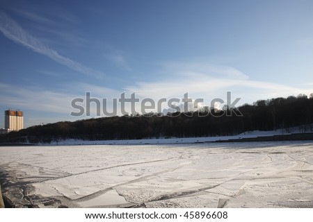 Winter river in the city. Moscow, Russia, embankment of the Moskva River