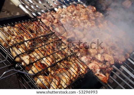 Outdoor cooking. Barbecue chicken and meat.
