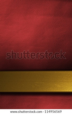 Red paint leather background or texture with gold metal strip