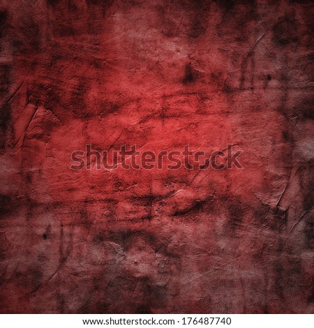 Grunge texture of a dilapidated wall in a red tone with fog effect added