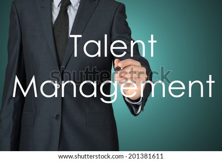 businessman writing talent management