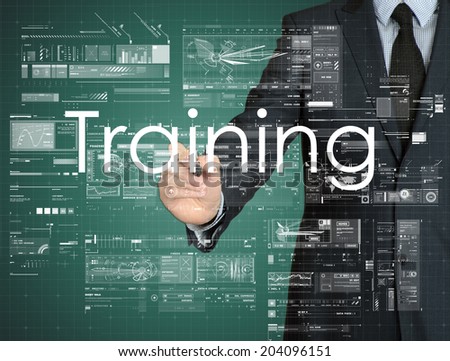 businessman handwriting Training on a transparent board