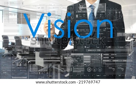 businessman writing on transparent board Vision with office in background