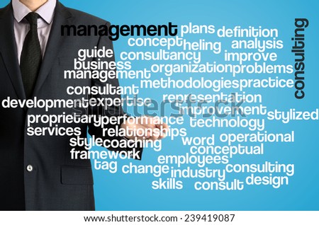 Business man presenting wordcloud related to management consulting on virtual screen