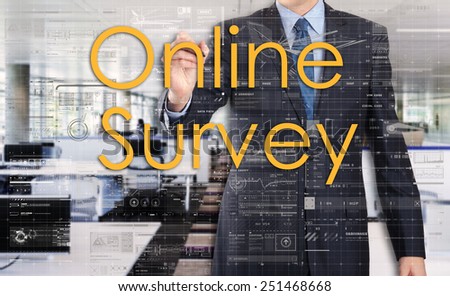 businessman writing online survey and drawing graphs and diagrams