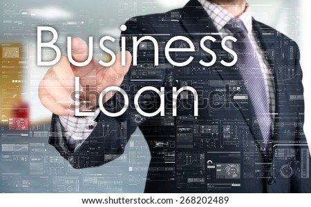 the businessman is choosing Business Loan from touch screen