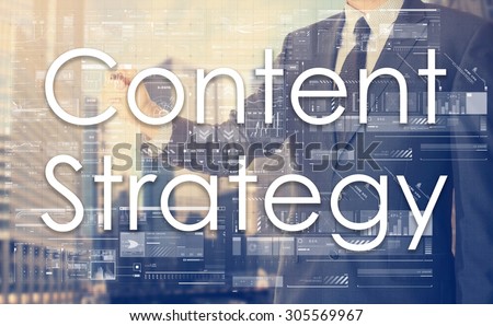 businessman writes on board text: Content Strategy - with sunset over the city in the background, the visible sun\'s rays in a picture are symbolizing the positive attitude