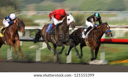 INGLEWOOD, CA - DEC 8: Jockey Juan Hernandez (black/blue cap) races \