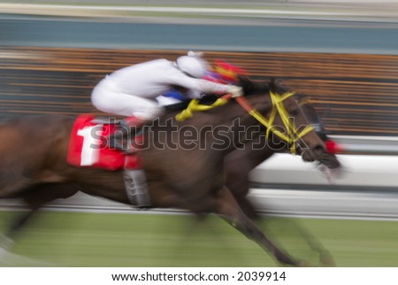 stock photo : Neck and Neck Horse Race -- Motion Blur