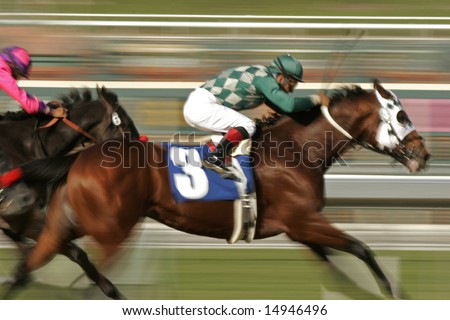 Racing Jockey and Thoroughbred Horse at Slow Shutter Speed -- Motion Blur