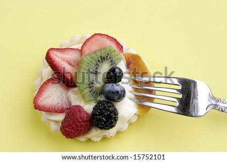 Delicious Fruit Tart with Silver fork