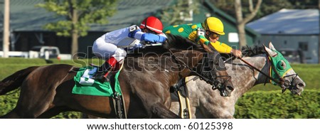 SARATOGA SPRINGS, NY - AUG 29: Jockey Edgar Prado (red cap) guides Missinglisalewis to a third-place finish in an allowance race at Saratoga Race Course on Aug 29, 2010 in Saratoga Springs, NY.