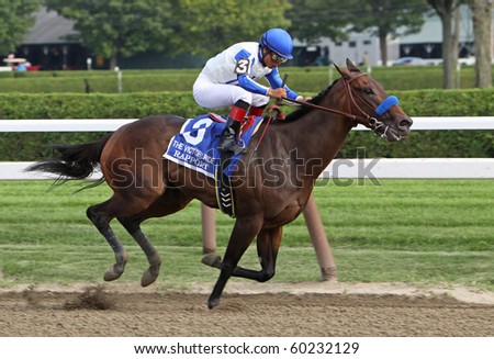SARATOGA SPRINGS, NY - AUG 28: Jockey Martin Garcia pilots Rapport to a win in The Victory Ride Stakes at Saratoga Race Course on August 28, 2010 in Saratoga Springs, NY.
