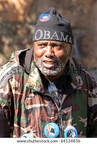 BRIDGEPORT, CT - OCT 30: An unidentified Obama supporter attends a rally to see President Obama and senate-hopeful Dick Blumenthal on Oct 30, 2010 in Bridgeport, CT.