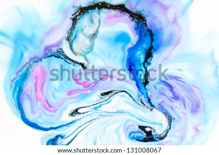 Blue, pink and black ink in abstract heart shape, background.