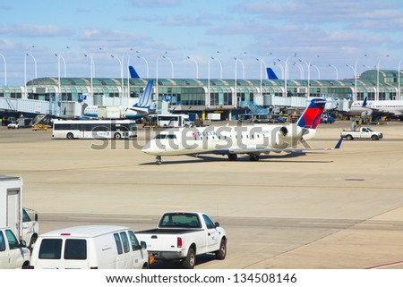 CHICAGO-APRIL 1:Delta Connection is a flight connection service operating short and medium haul flights, shown here at Chicago's O'Hare Airport, USA's second busiest  airport, April 1, 2013 in Chicago