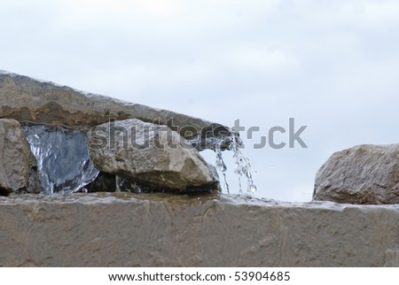 Meditative artificial composition with stone and water