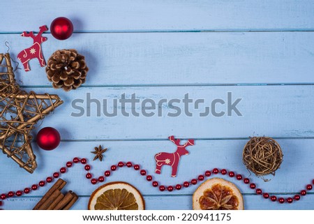Retro hand made natural Christmas decoration with copy space on wooden background
