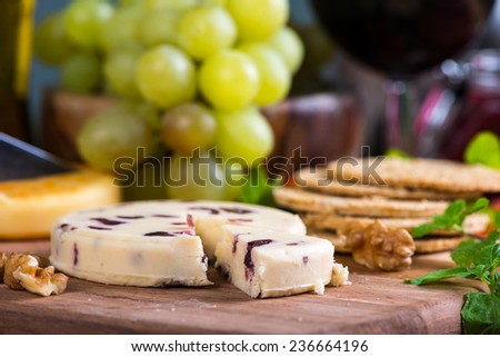white soft stilton cheese with cranberry and oat cakes