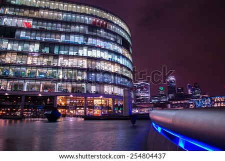 London modern finance district in downtown illuminated at night.