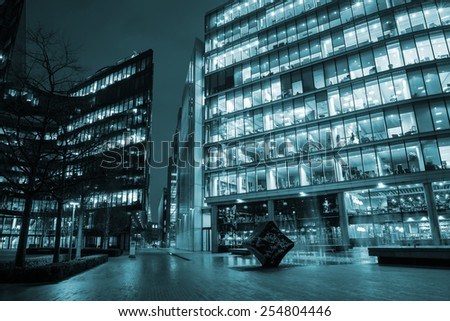 London modern finance district in downtown illuminated at night.