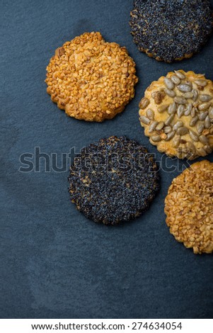 Healthy snacks with seeds, food background from above