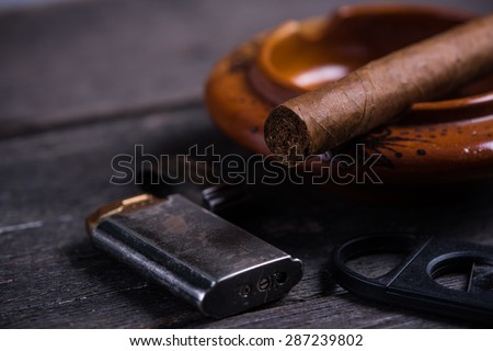 [Obrazek: stock-photo-cuban-cigar-in-ashtray-with-...239802.jpg]