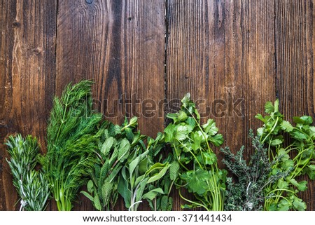 Aromatic herbs and spices from garden, healthy cooking concept, lay flat from above