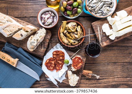 Traditional tapas served for share with friends in restaurant or bar.