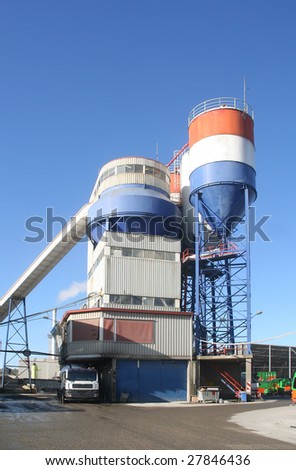 Cement factory painted in the colors of the Dutch flag