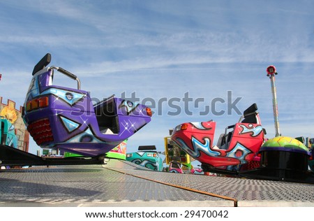 Cars in a fun fair carousel